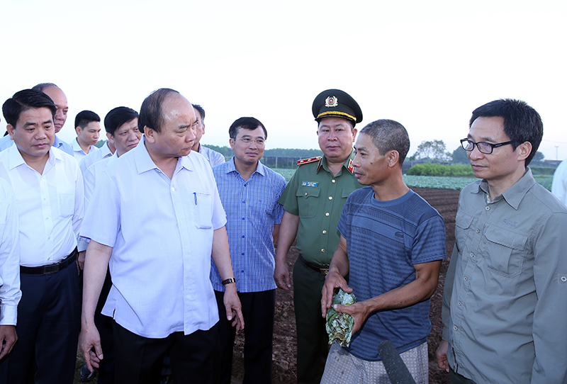 thu tuong nguyen xuan phuc vi hanh den cho dau moi long bien