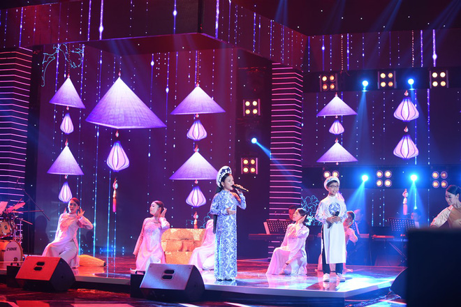 than dong duc vinh dang quang quan quan kep cua tuyet dinh song ca nhi