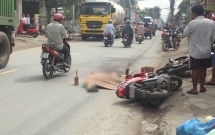 tphcm nga xuong duong sau va cham voi container nguoi dan ong bi banh xe can tu vong