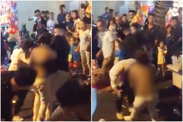 xon xao clip nguoi phu nu bi lot sach ao van hung ho lao vao danh nhau o pho hang ma dem trung thu