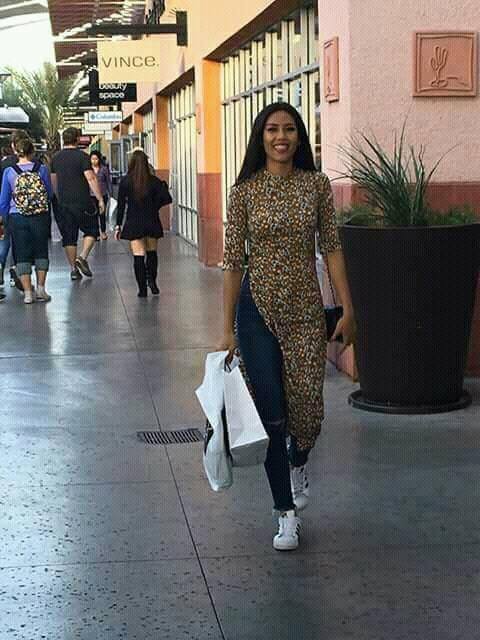 di my thi miss universe ma nguyen thi loan lai mac ao dai voi jeans rach va vay thi sen khong tuong