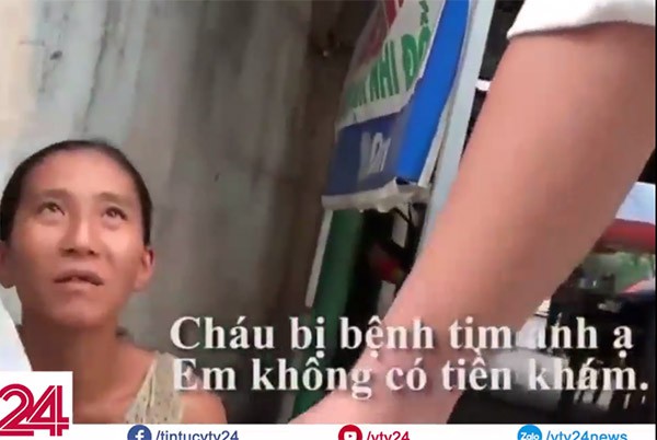 doi tuong trong clip lam dung tre em de xin tien tiem chich ma tuy bi bat giu dua be chinh la con ruot