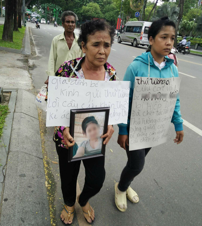 vu be gai 13 tuoi ca mau uong thuoc tu tu nghi bi hang xom xam hai de nghi truy to nghi can