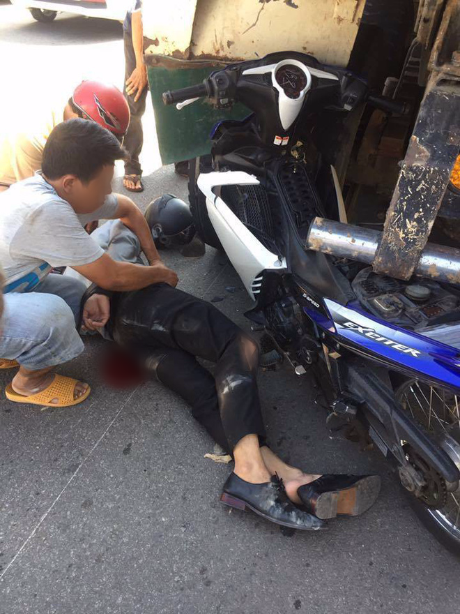 binh duong xe exciter dinh luon vao duoi xe tai sau va cham